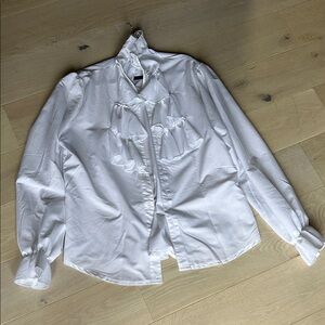 Elegant White Ruffled Blouse